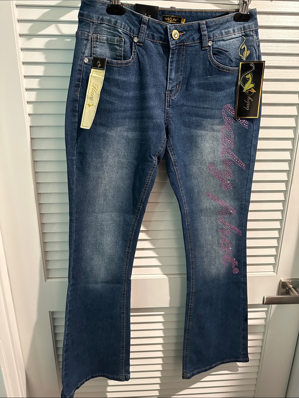 NWT Baby Phat Bootcut Jeans with Pink Embellished Crystals on Leg and Back.